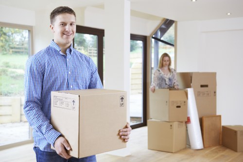Professional movers handling furniture carefully