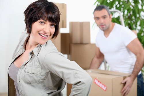 Team of professionals handling corporate office moving.