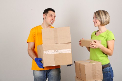 Professional mover assisting with loading in Brent