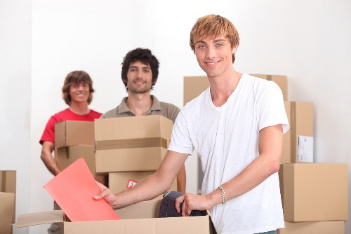 Professional movers using a removal truck in Brent